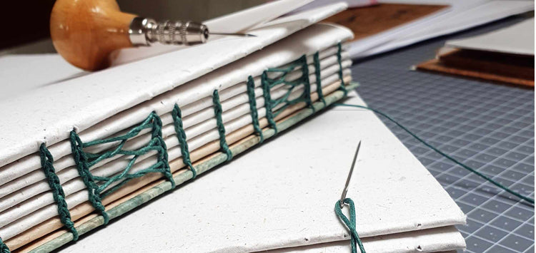 Book being sewn