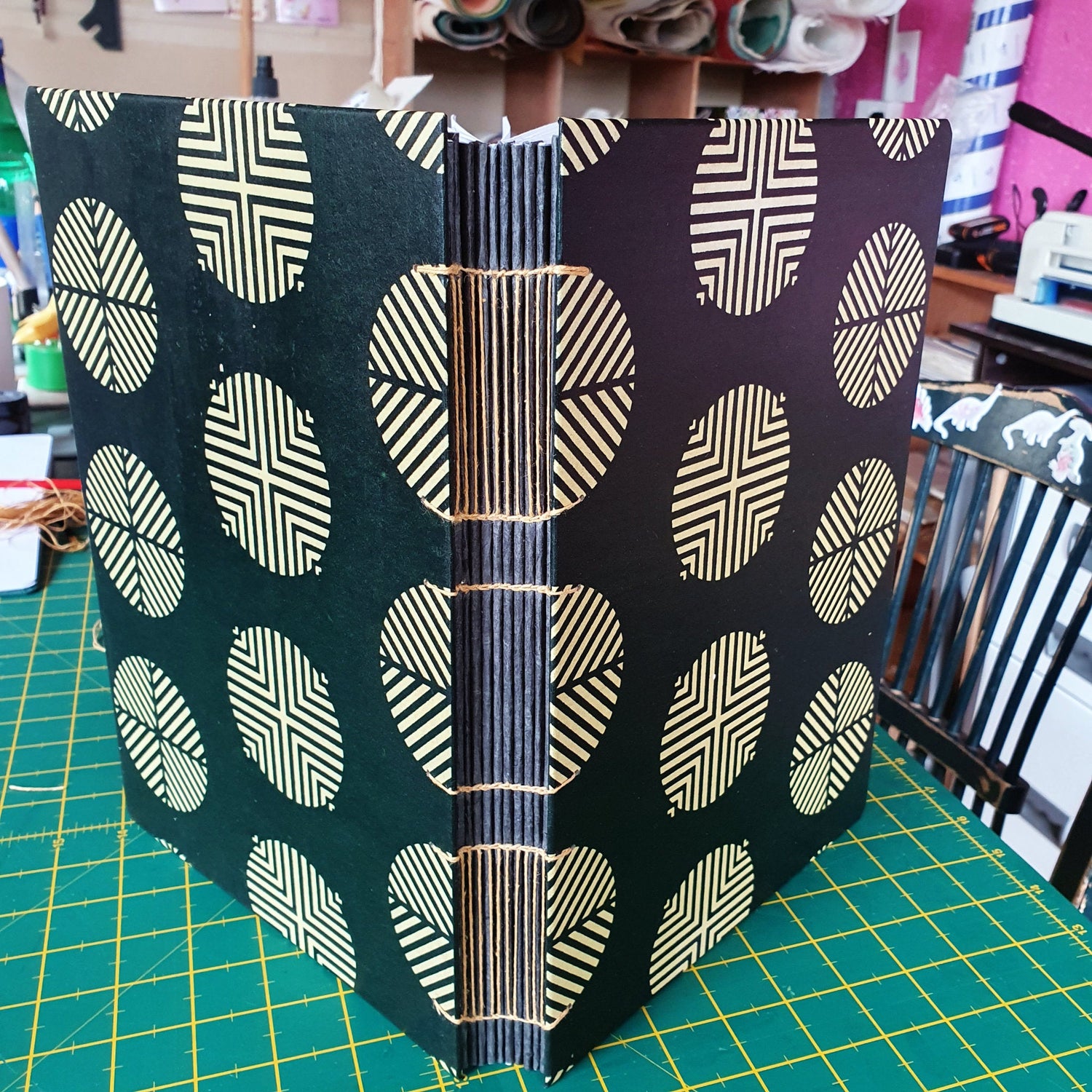 A sketchbook with an exposed spine ladder binding