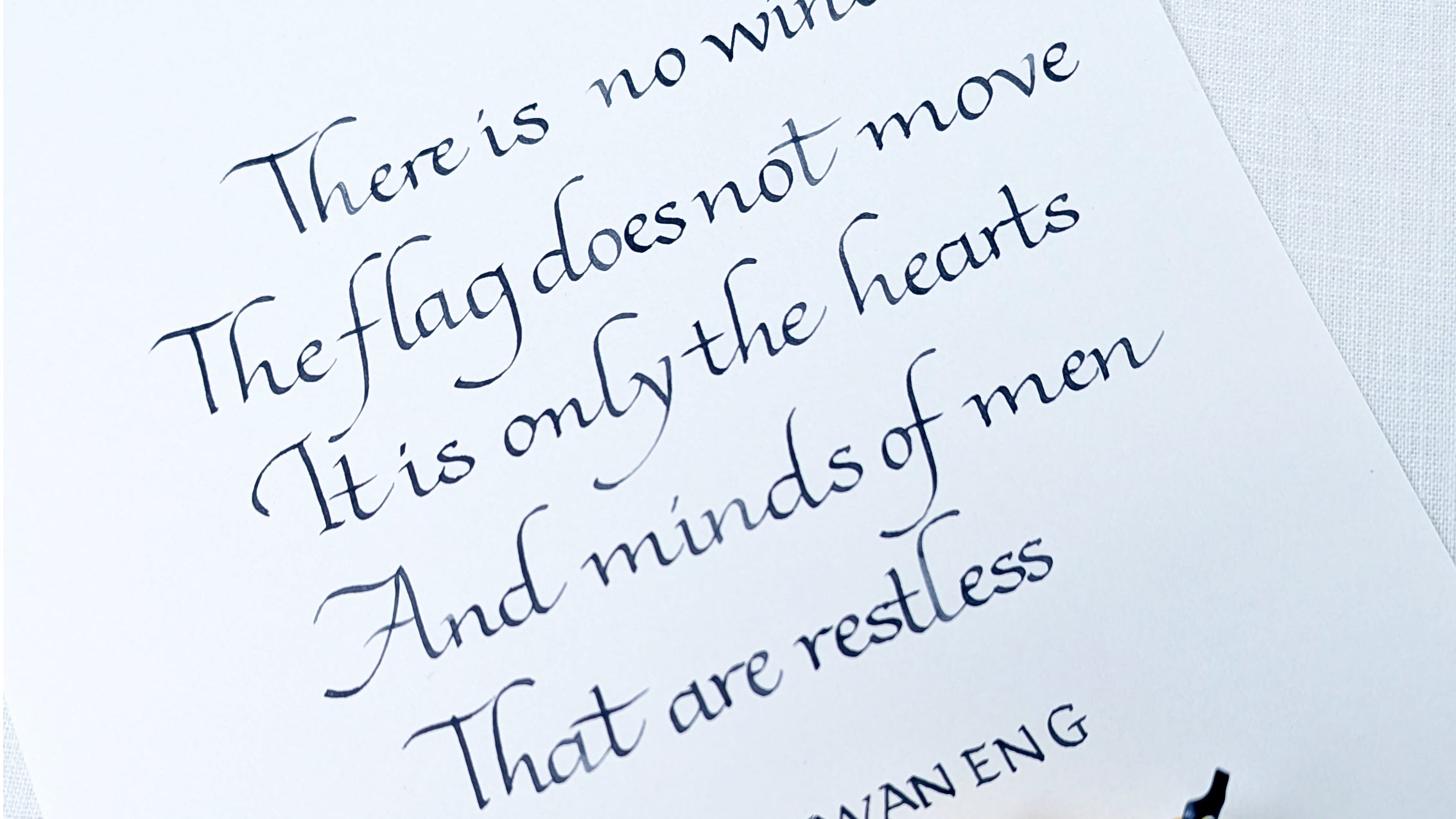 Hand written calligraphy Italic Flourish Calligraphy: quote on a white background