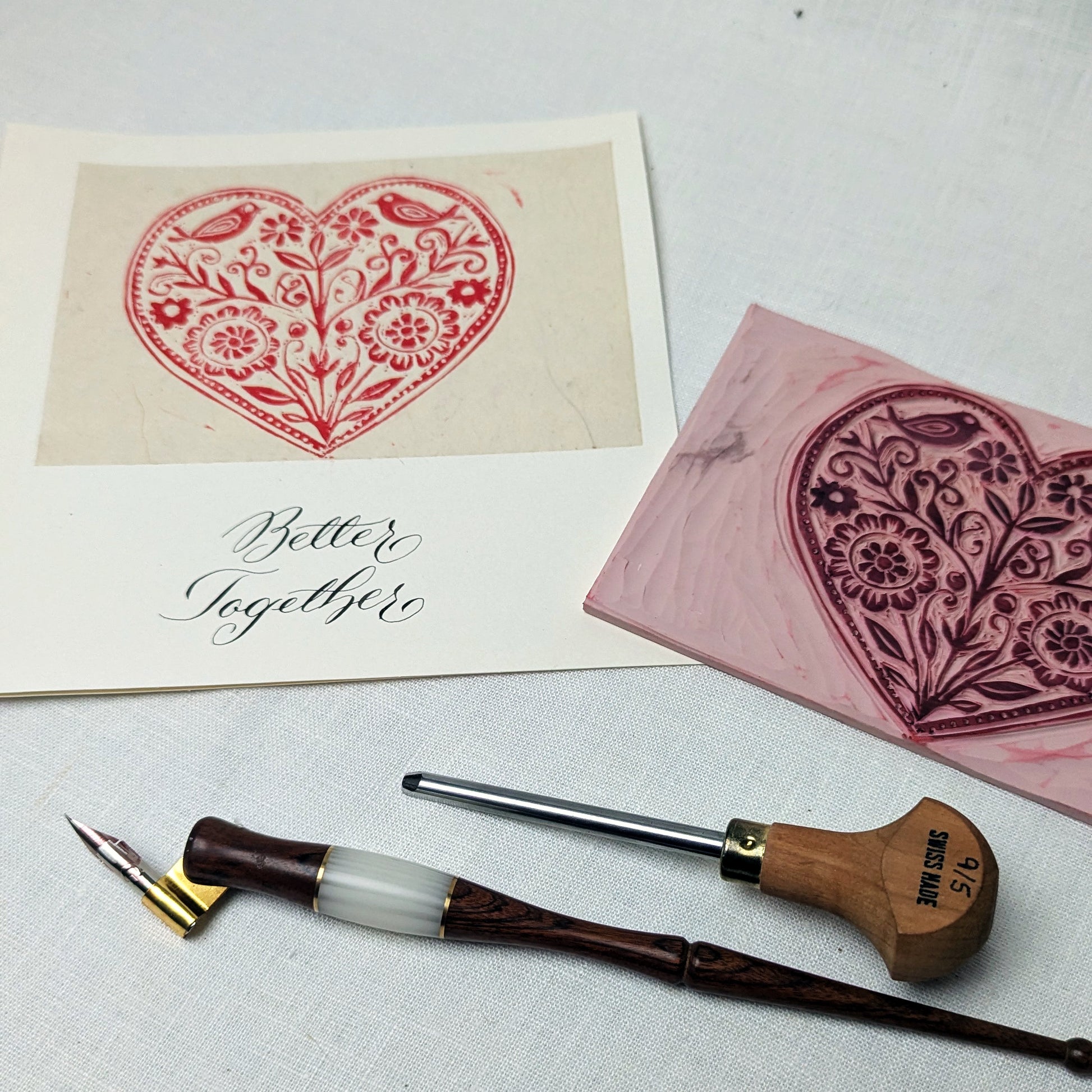 This handmade card features an original heart-shaped lino print filled with floral and bird motifs — a design that speaks of growth, harmony, and the small, living details that make a partnership flourish. It’s a calm, thoughtful expression of togetherness, without grand promises or excess sentiment. Dip pen and chisels added