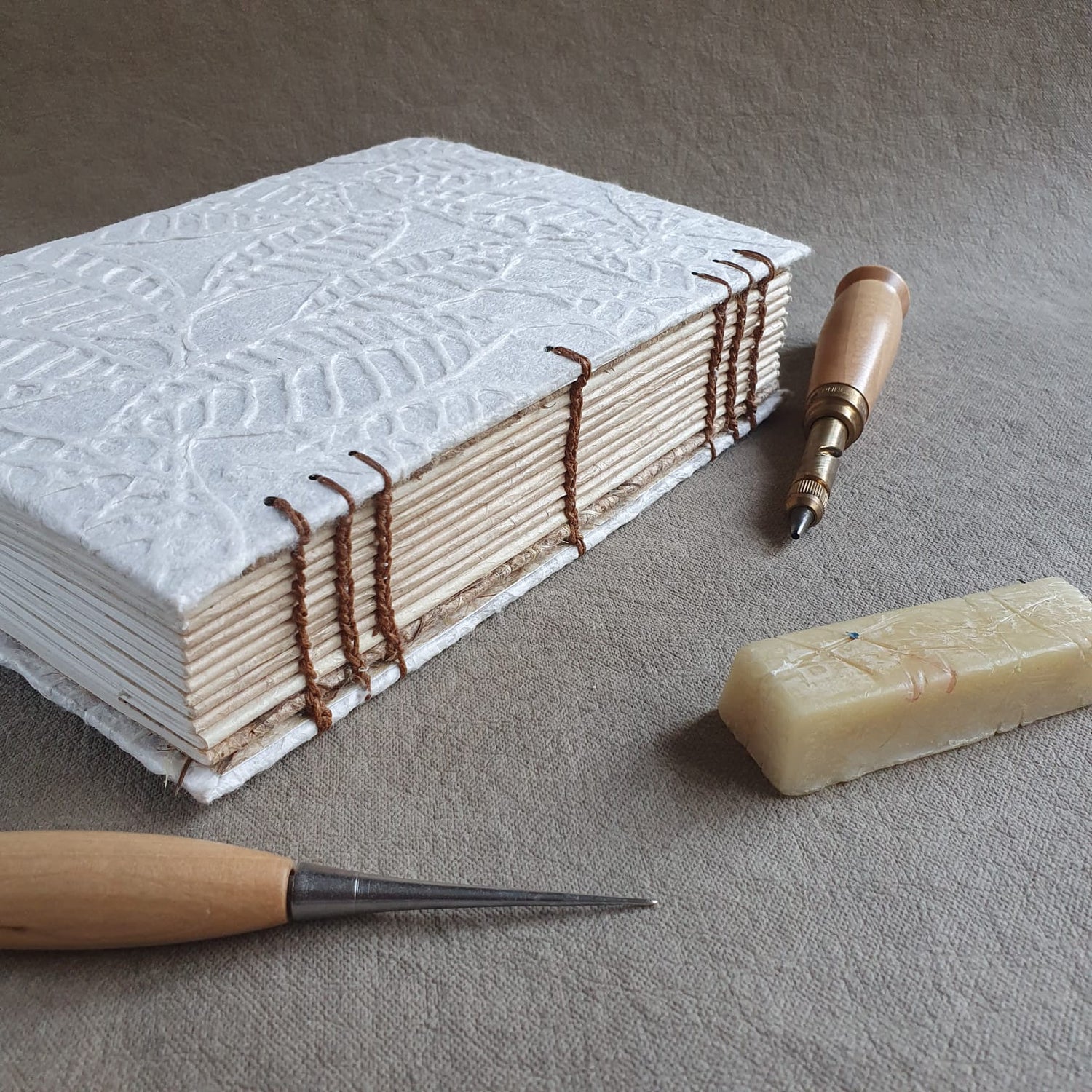 Bespoke Personal diary with exposed spine and coptic sewing 