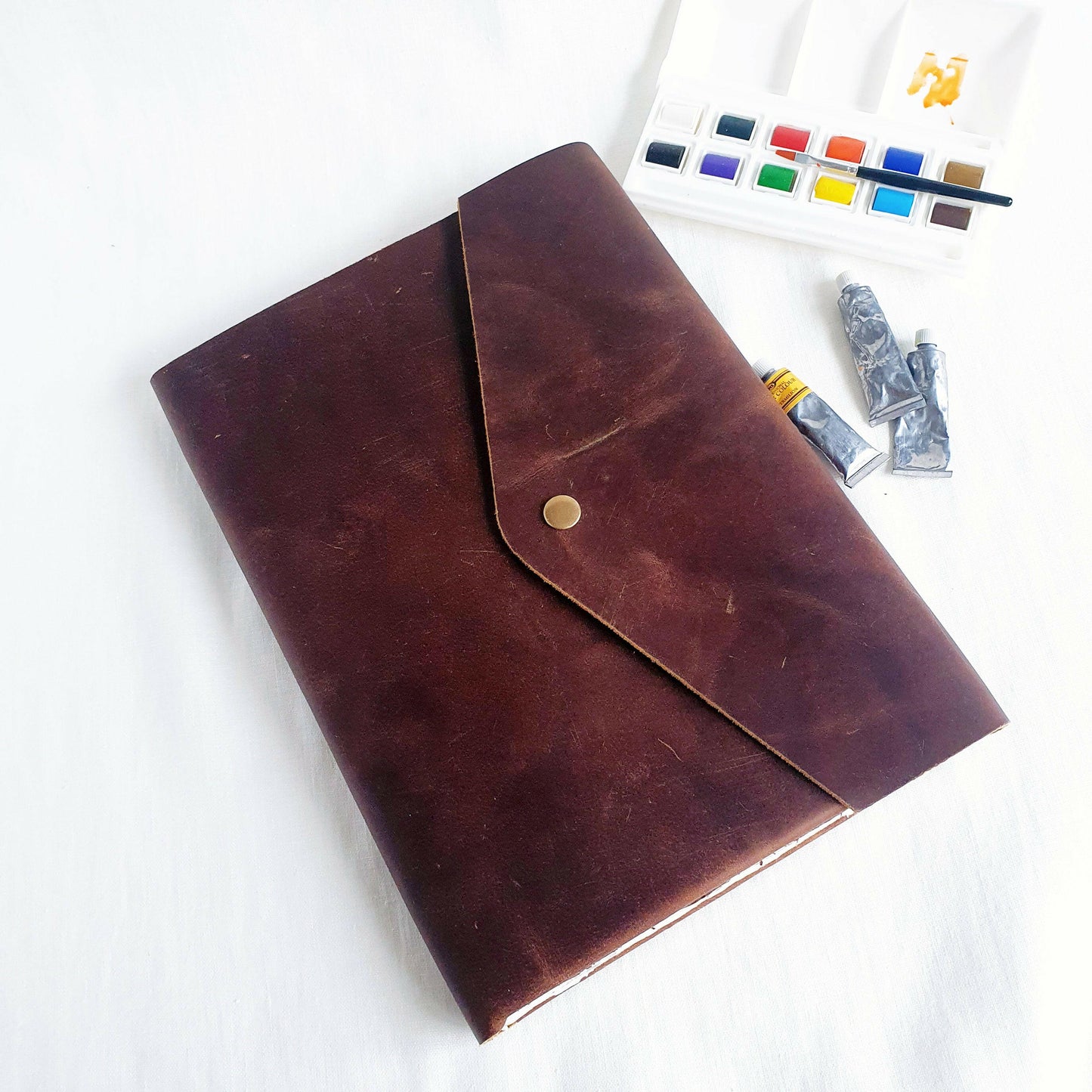 Refillable Art Journal with a Thick Leather Snap Protection - The Wee Bindery (Store description) Sketchbook 