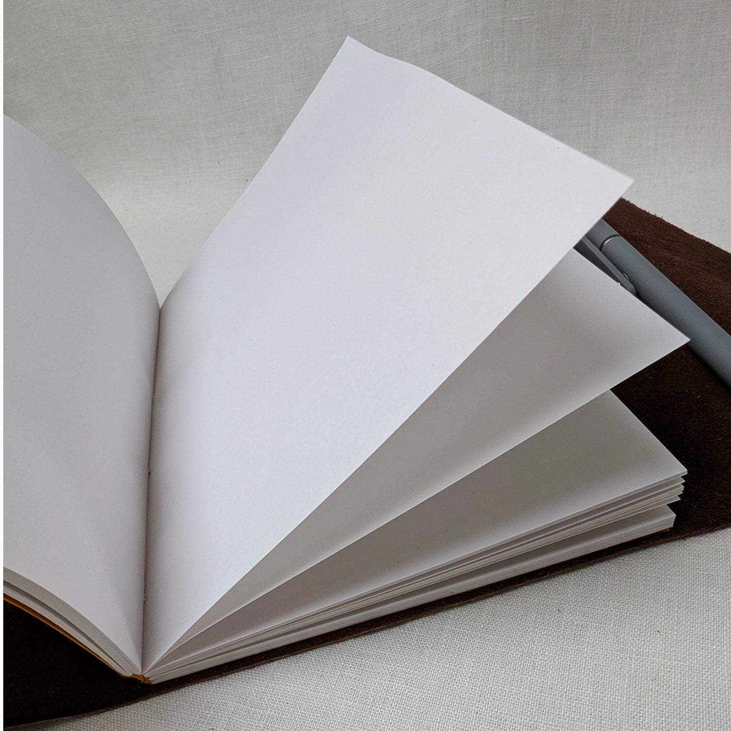 Roll-Up Suede Leather Journal – A5 Travel Companion with Buckle - The Wee Bindery  Notebooks 